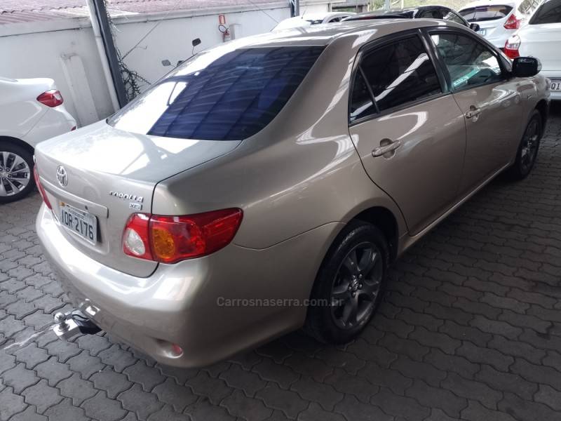 TOYOTA - COROLLA - 2008/2009 - Bege - R$ 55.900,00